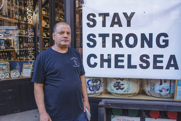 Message received: Binod Bhattarai, of Landmark Wine &amp; Spirits — a stop on Sept. 24’s Chelsea Small Business Crawl. Photo by Naeisha Rose.